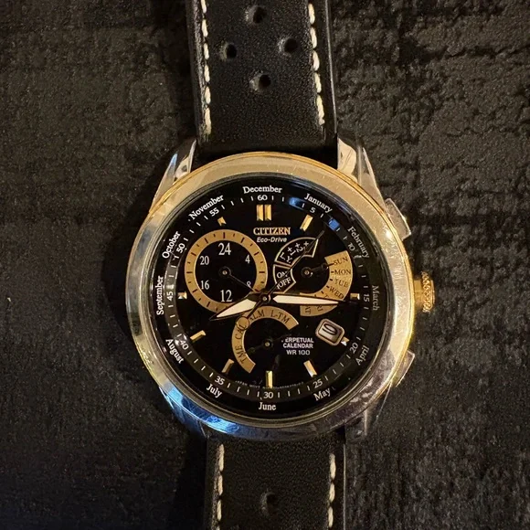 Citizen Eco-Drive Black and Gold watch - Picture 1 of 5